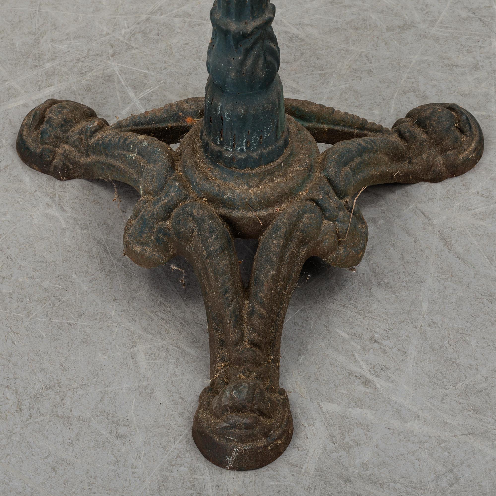 Cast iron stands, 20th century.