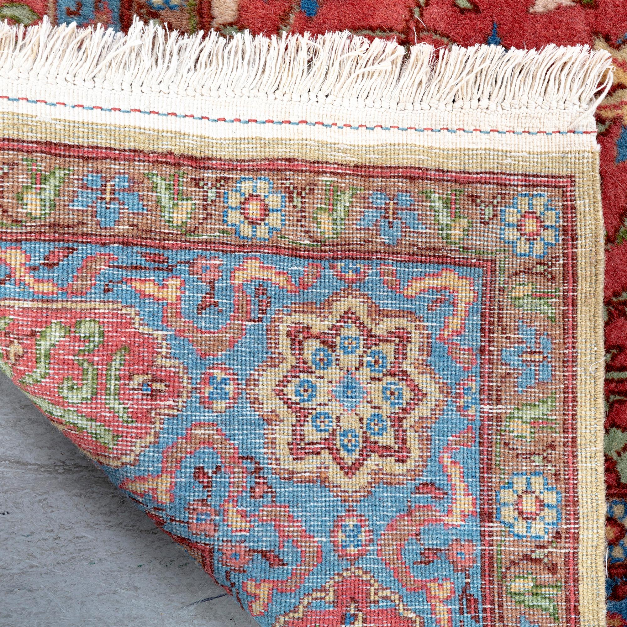 A semiantique signed Tabris carpet ca 274x189 cm.