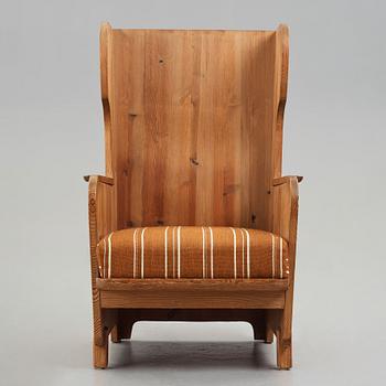 Axel Einar Hjorth, a "Lovö" stained pine armchair, Nordiska Kompaniet, Sweden, 1930's.