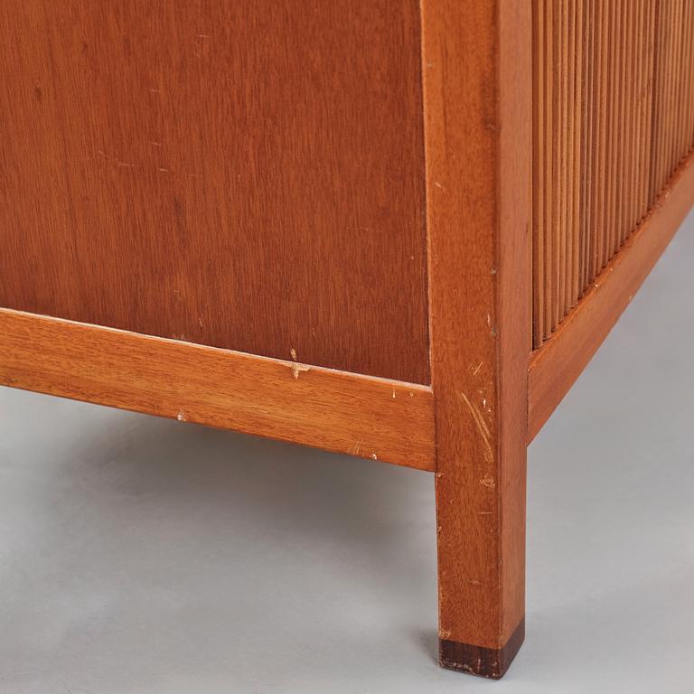 David Rosén, a mahogany and teak cabinet, for Stockholm's Association of Crafts, signed and dated 1959.