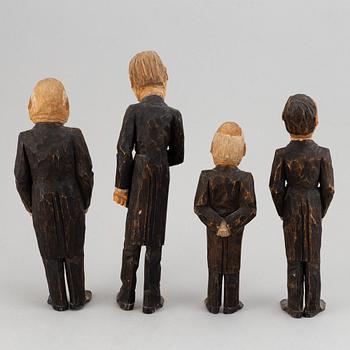 Four wooden sculptures by Axel Ericsson, signed and dated -29.