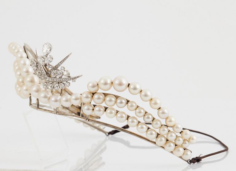 A tiara with cultured pearls and a detachable WA Bolin platinum brooch set with old-cut diamonds.