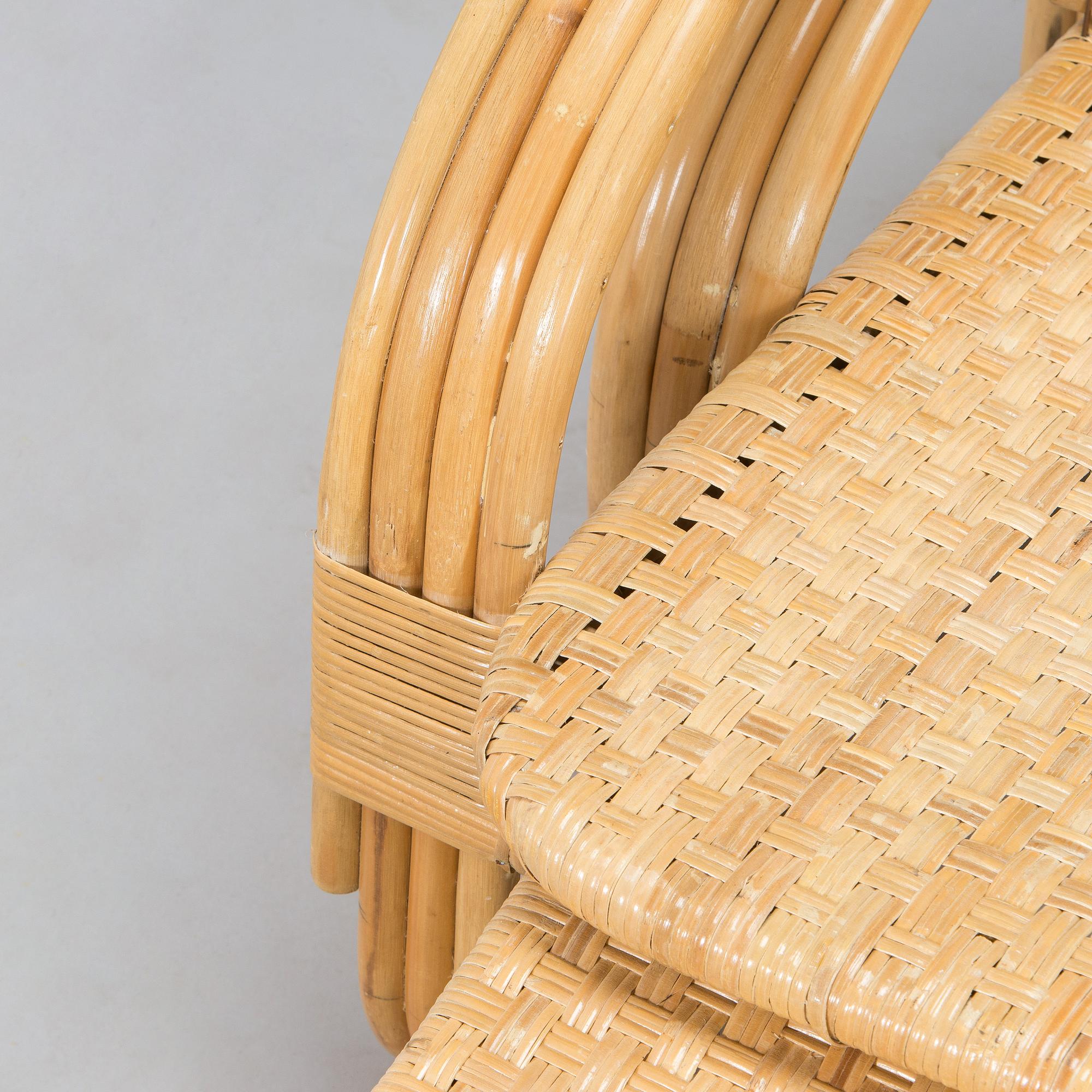A rattan lounger, late 20th century.