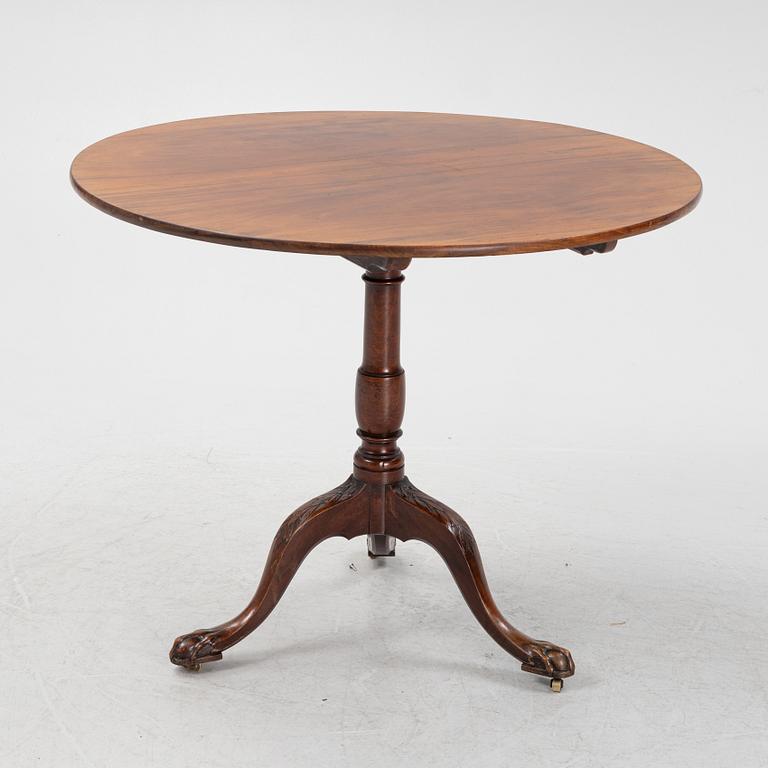 An English mahogany table, second half of the 19th Century.