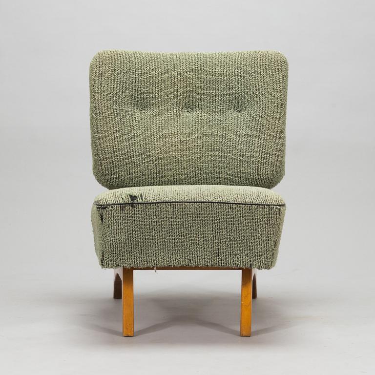 Oiva Parviainen, a mid-20th century 'Susanna' armchair for  Lahden Lepokalusto, Finland.