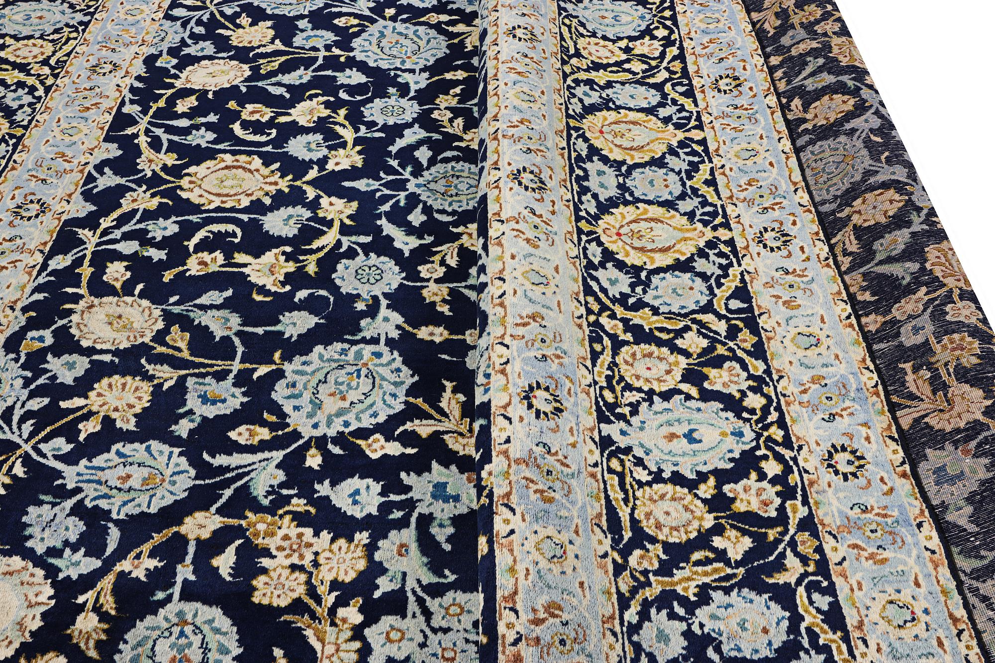 A Kashan carpet, c. 395 x 305 cm.