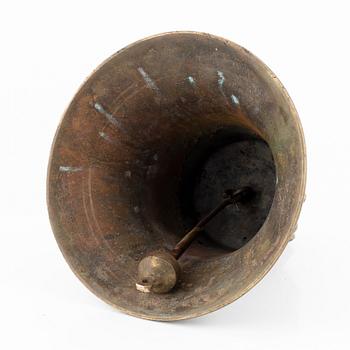 A brass gruel bell, dated 1879.