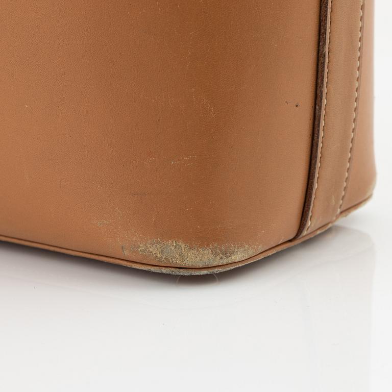 Hermès, a vintage tan leather bag, mid 20th century.