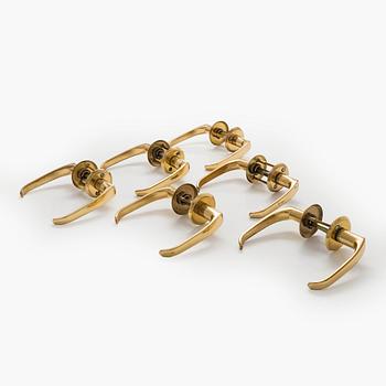 A set of six 1960s-70s door handles.