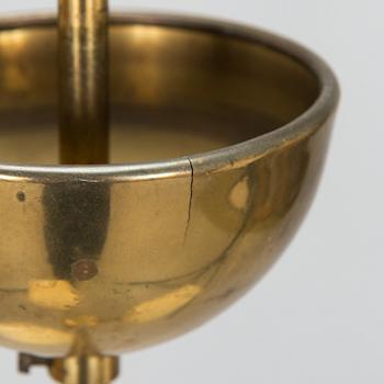 A mid 20th century brass pendant ceiling light, manufactured by Itsu, Finland.