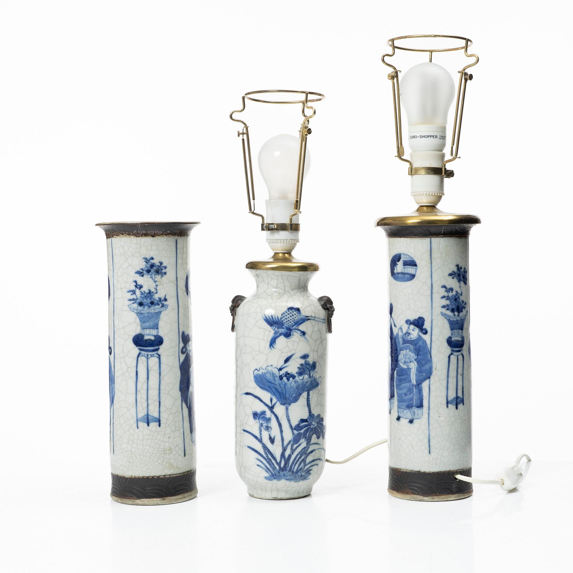 A group of three Chinese porcelain vases, two of them converted into table lamps, around 1900.