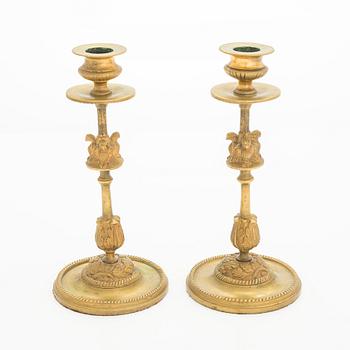A pair of early 20th century candlesticks.