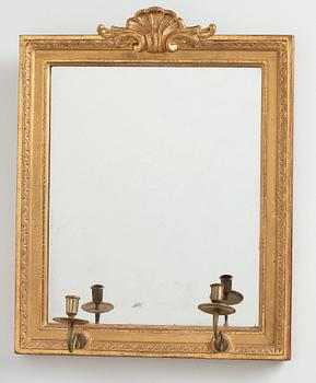 A pair of Gustavian two-light girandole mirros, one dated 1784.