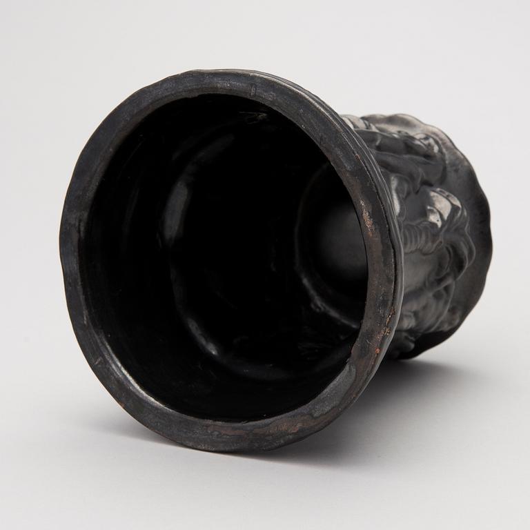 a plaster decoration bowl, signed Aarre Aaltonen 1923.