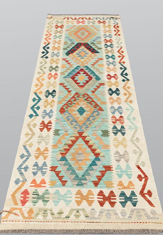 A Kilim runner, approx. 294 x 91 cm.