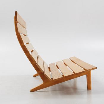 A sofa with a stool, Erik Jørgensen Møbelfabrik, Denmark.