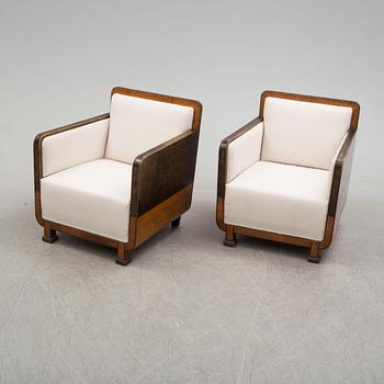 A pair of 1930´s art déco easy chairs.