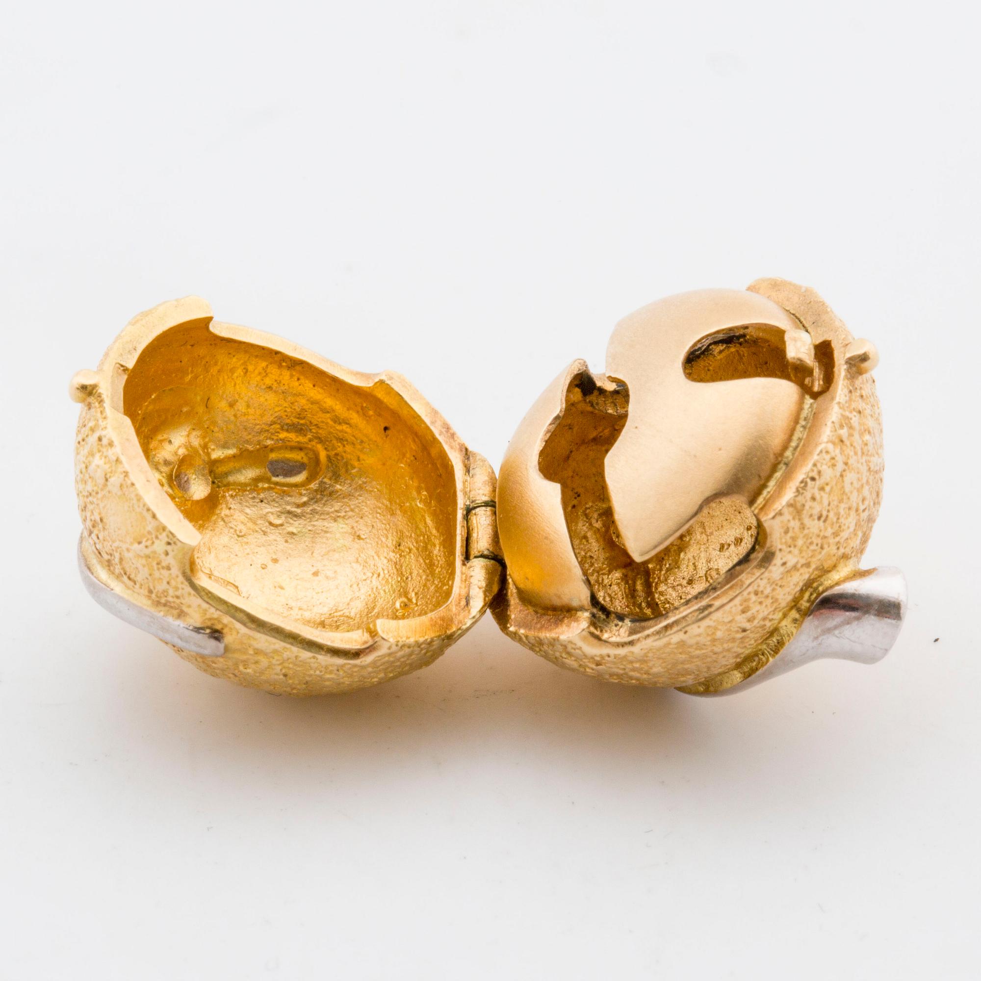 OLE LYNGGAARD, A 18K gold lock with small diamonds,.