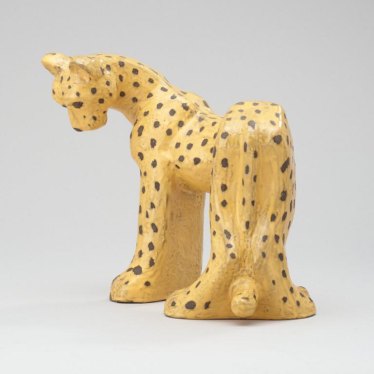 A Vicke Lindstrand yellow glazed ceramic figure of a leopard, Upsala-Ekeby.