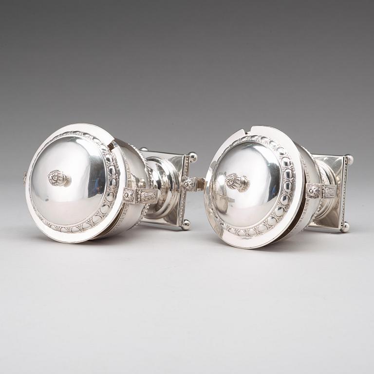 A pair of Swedish late 18th century silver sugar bowls and covers, mark of Pehr Zethelius, Stockholm 1780 and 1781.