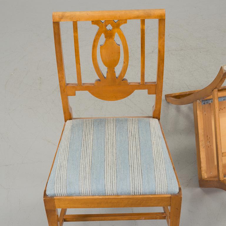 A set of 8 first half of the 20th century chairs veneered with birch.