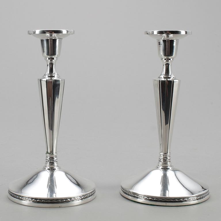LJUSSTAKAR, ett par, silver, MGAB, 1964.