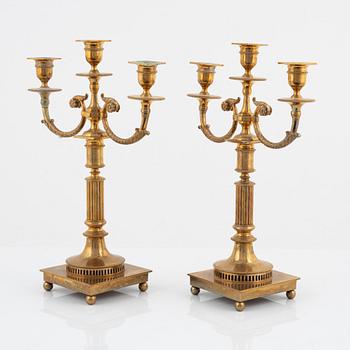 A pair of brass candelabras, GusumsBruk No 21.