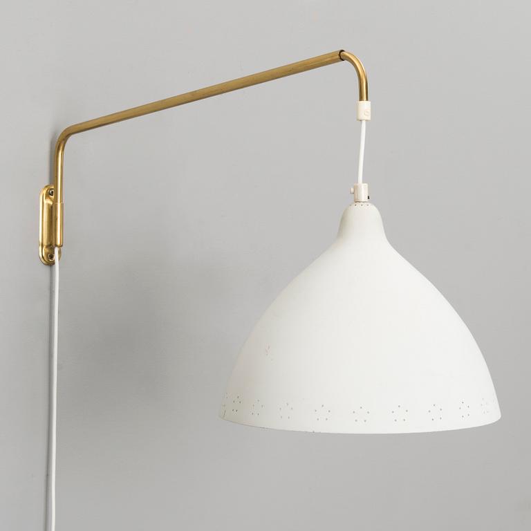 A mid 20th century wall light for Stockmann Orno.