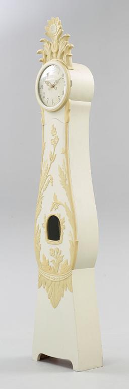 A Carl Malmsten painted and carved long case clock.
