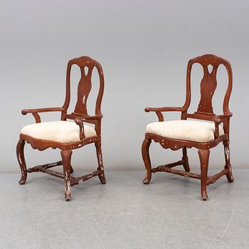 A pair of Swedish 18th century armchairs.