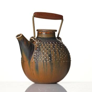 a stoneware teapot and 4 bowls, Gustavsberg Studio, Sweden, 1960-63.