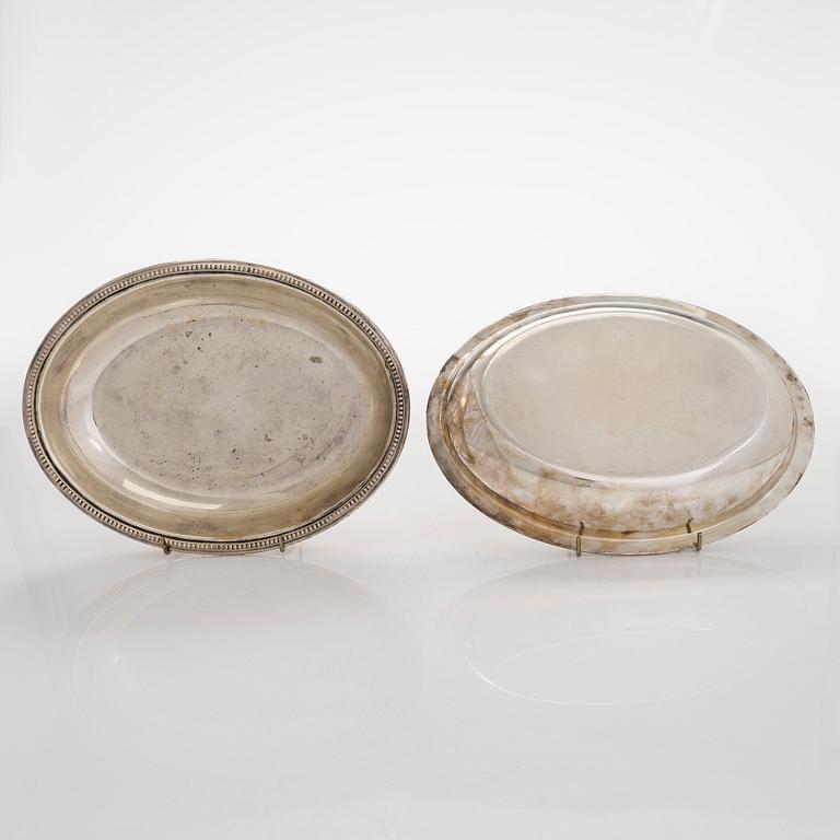 A set of four silver plated entree dishes, England.