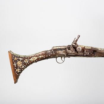 a 19/20th century musket, probably from north africa.