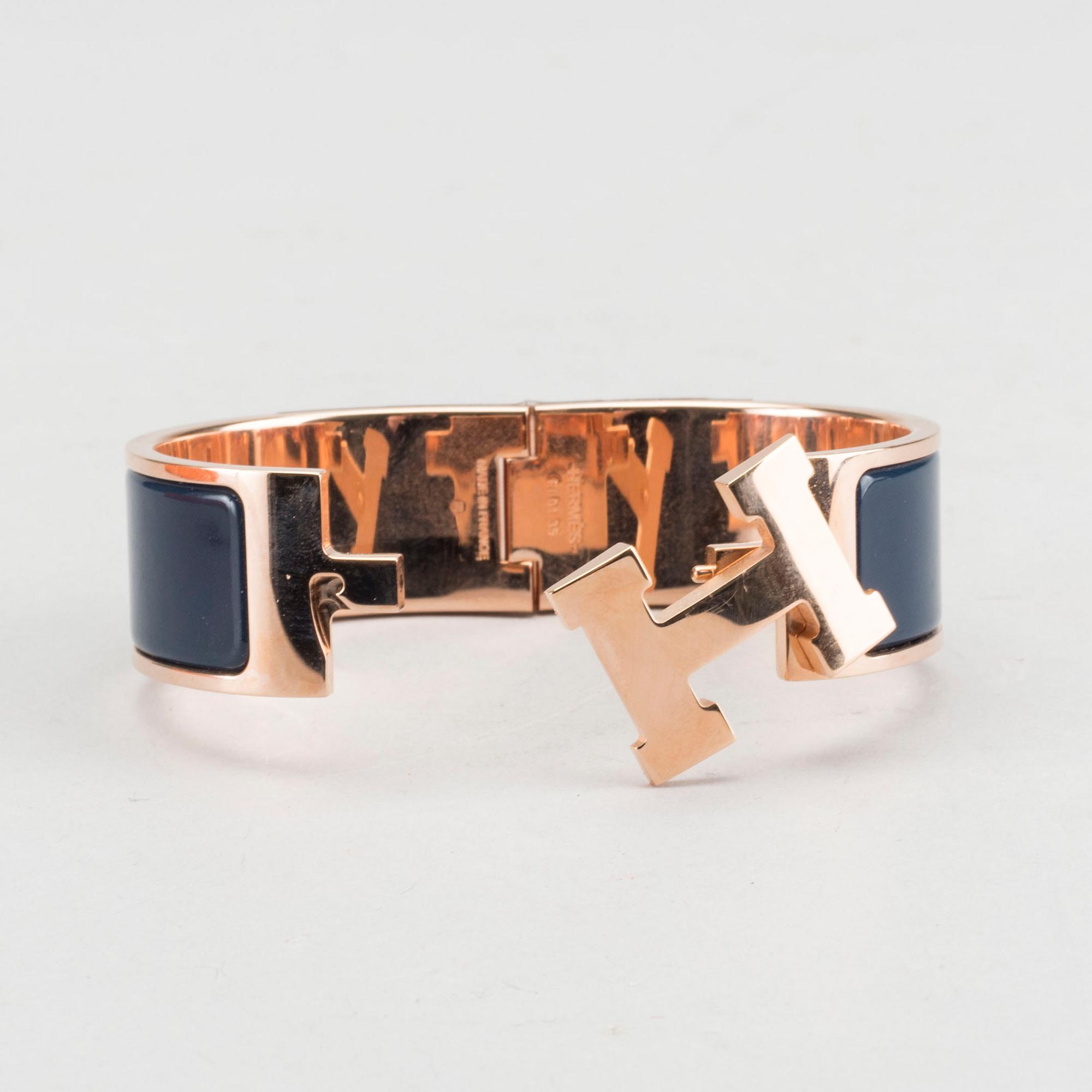 A Hermès "Clic-H" bracelet.