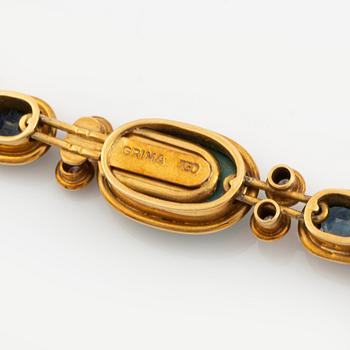 A Grima demi parure comprising a necklace and a pair of earrings.
