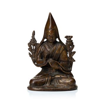 890. A Nepalese copper alloy figure of Tsongkapa, 20th Century.