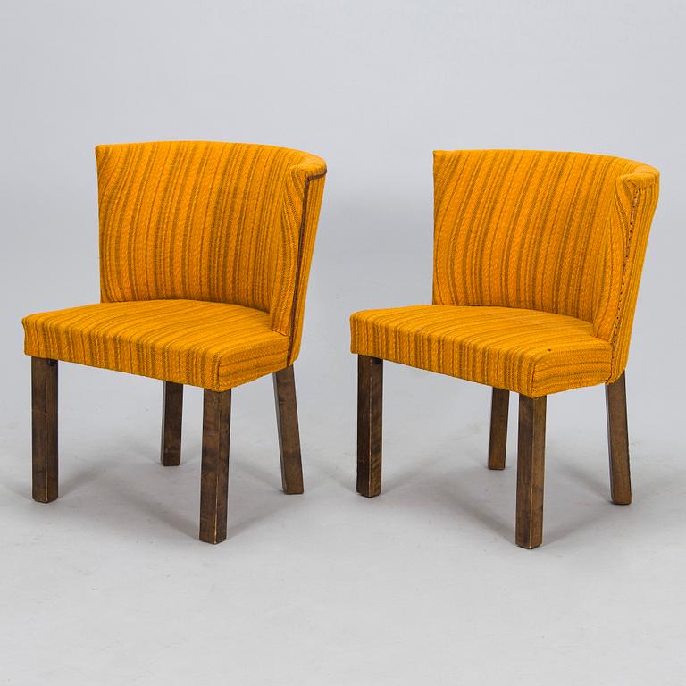 A Finnish 1930s dining table and eight chairs.