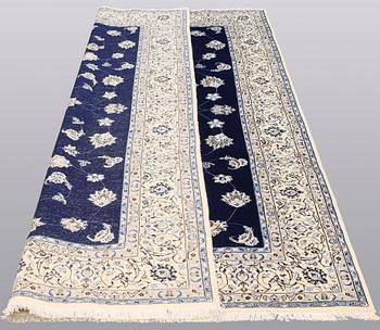 A carpet, Nain part silk s.k 9LAA, ca 312 x 199 cm.