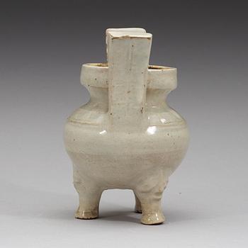 A pale grey-bluish glazed tripod censer with decor in relief, and archaistic mark, Ming dynasty (1368-1644).