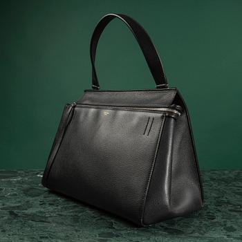 HANDBAG, "Large Edge Bag", Céline, 2013. Black leather with silver-tone hardware, pocket at back with snap closure.