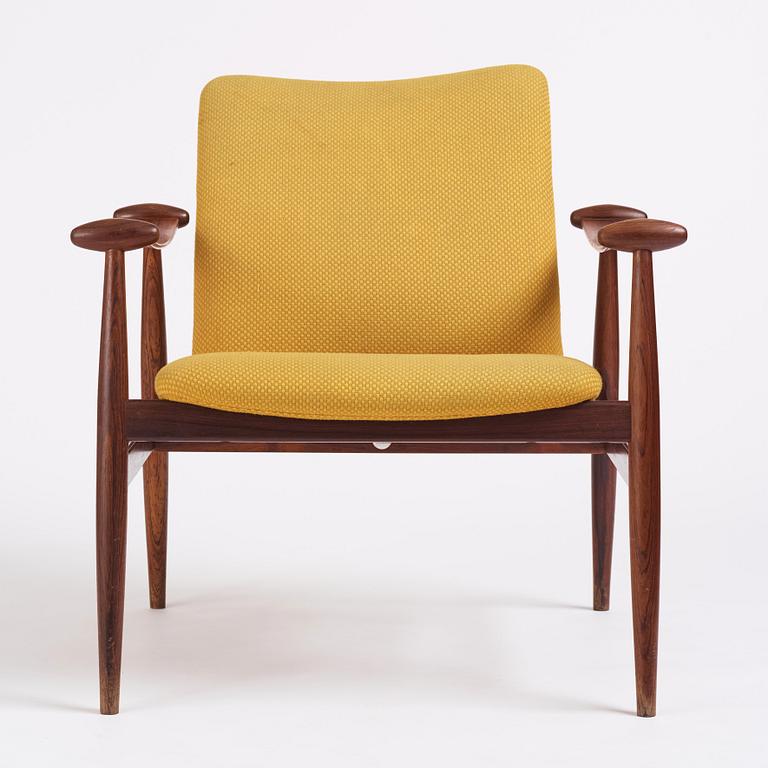 Finn Juhl, a 'model F-133' rosewood easy chair by France & Son, Denmark 1960s.