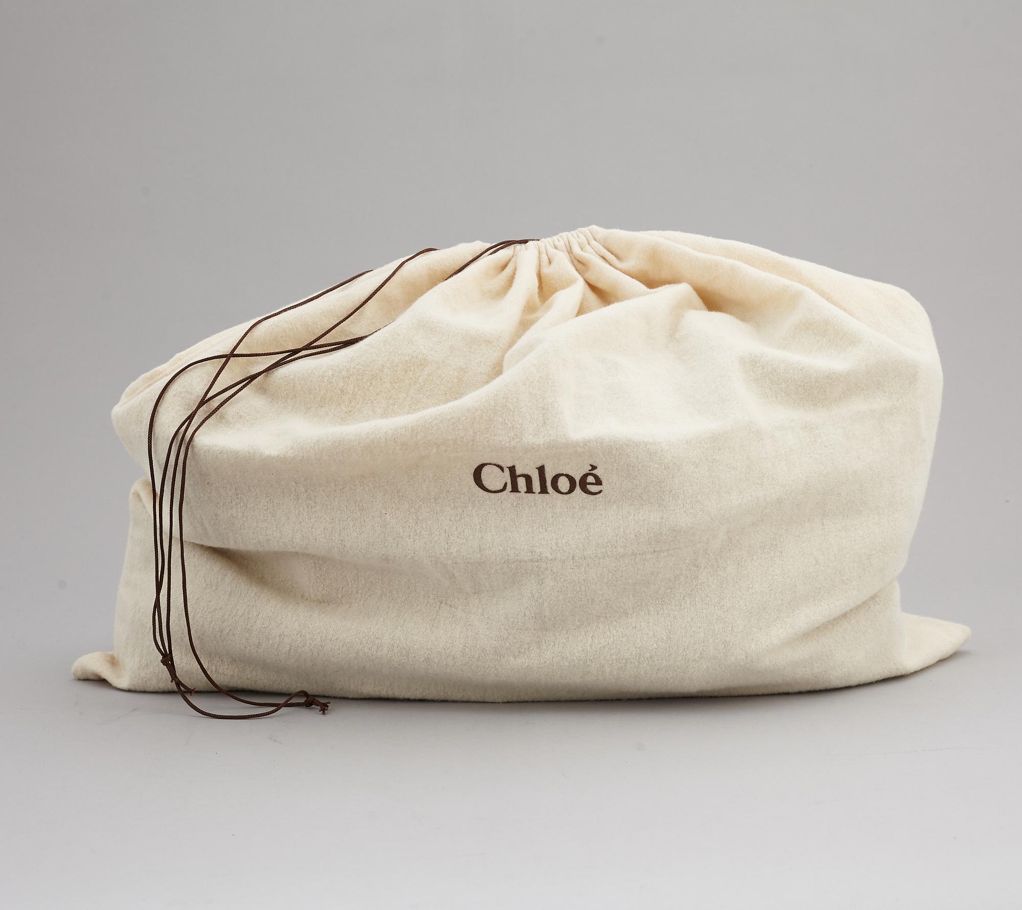 CHLOÉ, a brown leather bag.