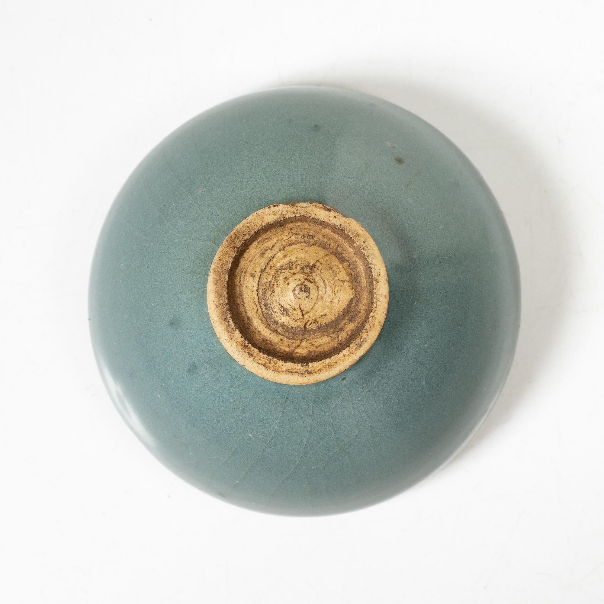 A Chinese Jun glazed bowl with a purple splash, late Qing dynasty / early 1900s.