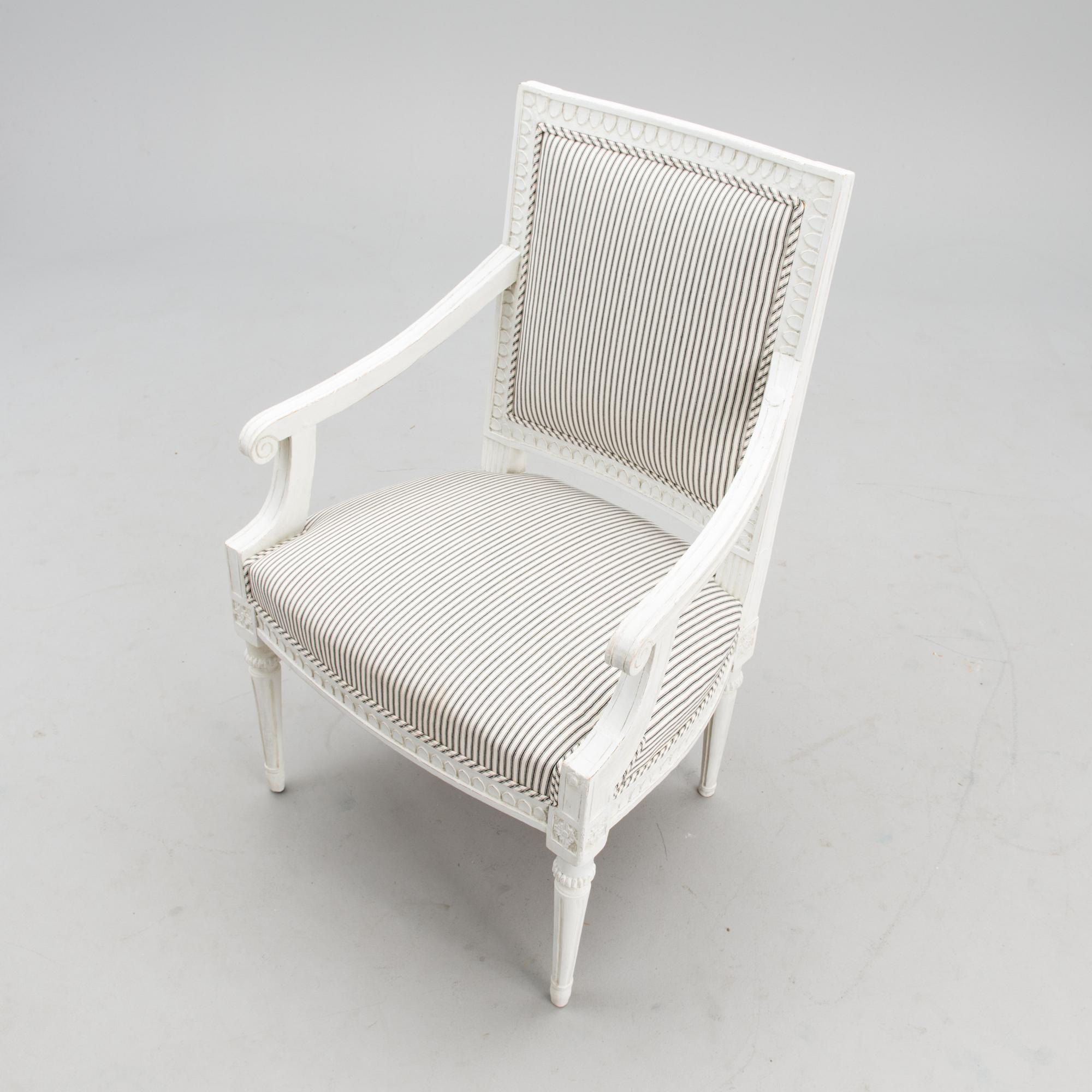 A late 18th century Swedidh Gustavian open arm chair.