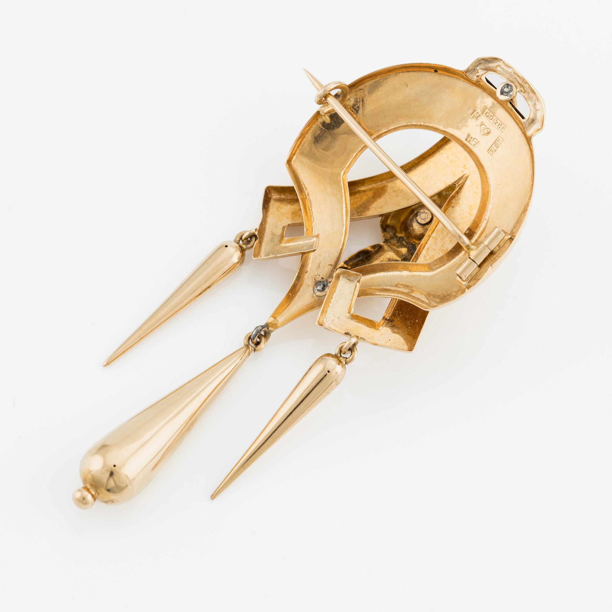 Brosch 18K guld med en pärla.