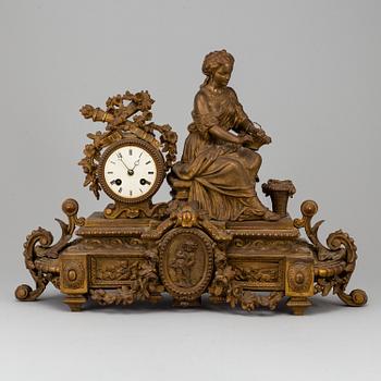 A  French 19th century mantle clock in Louis-XVI style.