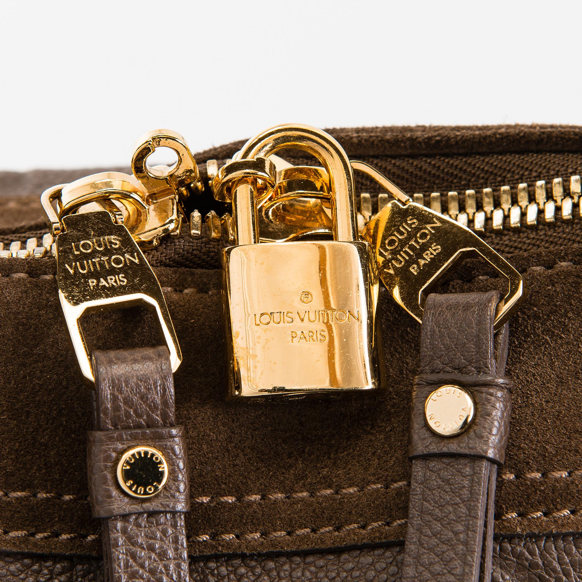 Louis Vuitton, Monogram Empreinte Suede Audacieuse Bag.