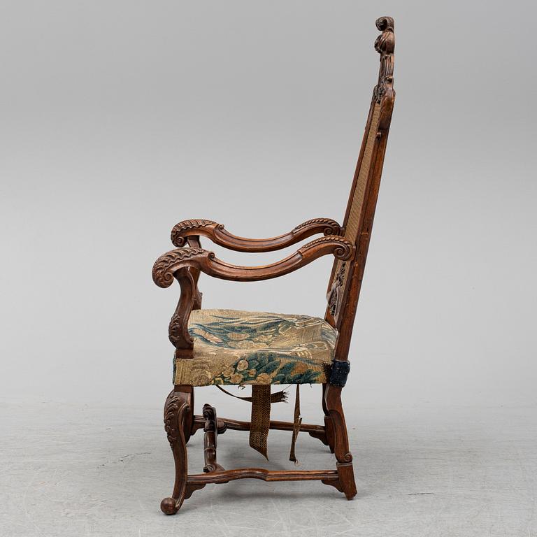 A 19th century baroque style armchair.