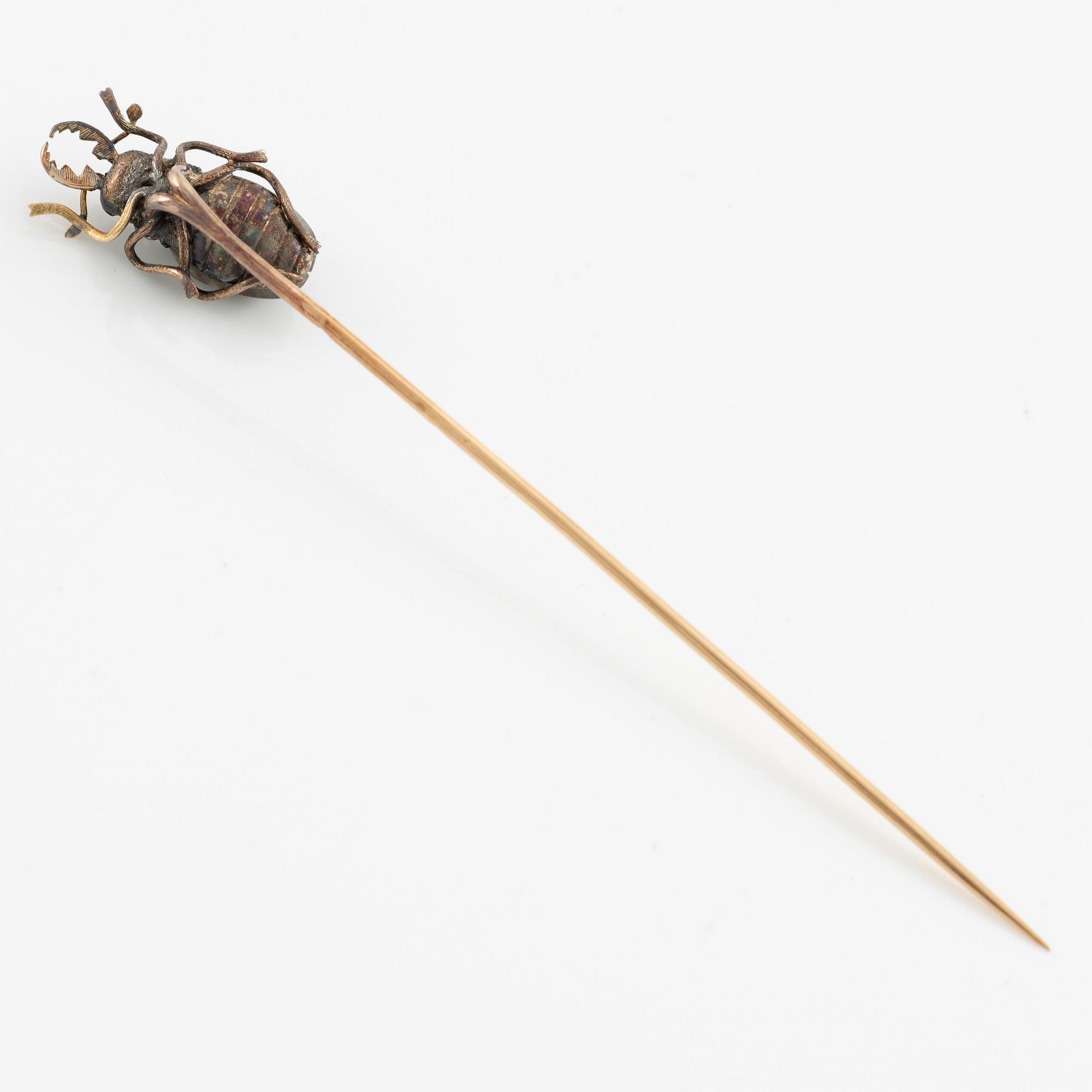 A brooch pin in the form of a beetle, 18K gold and silver with labradorite.
