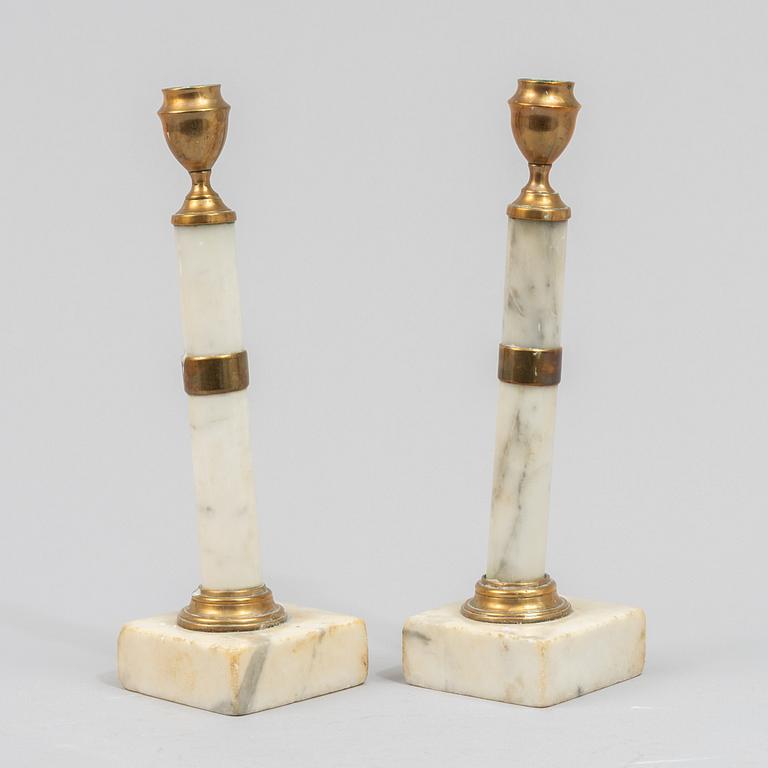 A pair of Gustavian style candelsticks, 13th/20th century.